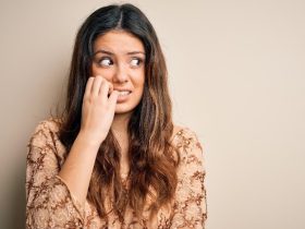 Why do you indulge in nail biting and how to stop it | HealthShots