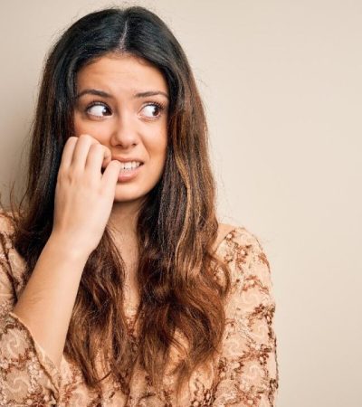 Why do you indulge in nail biting and how to stop it | HealthShots